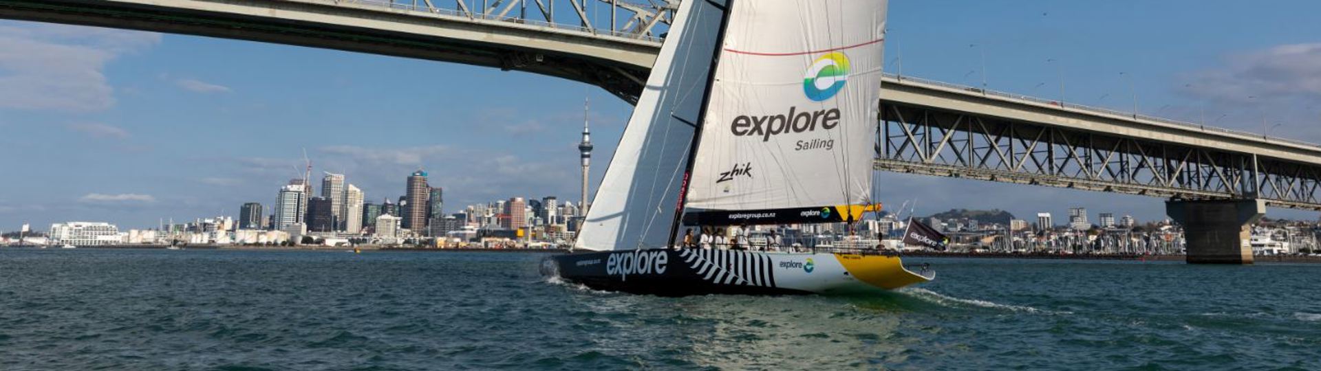AC68 sailing under the Auckland Harbour Bridge