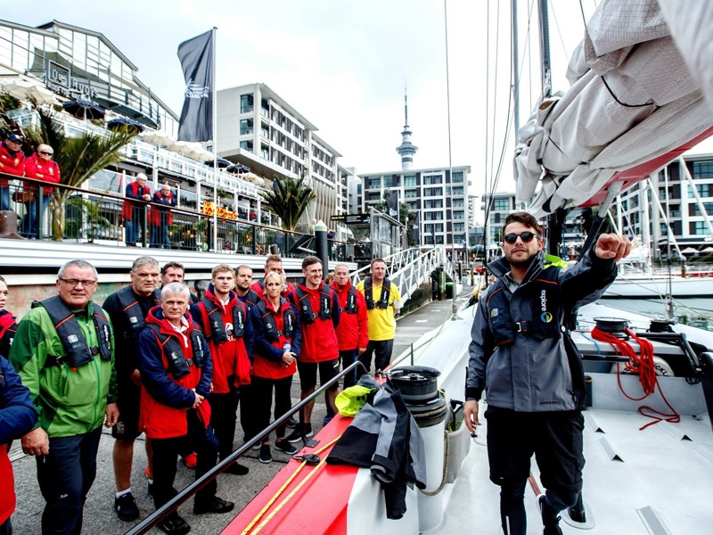 Passengers getting ready to sail on an America's Cup Yacht