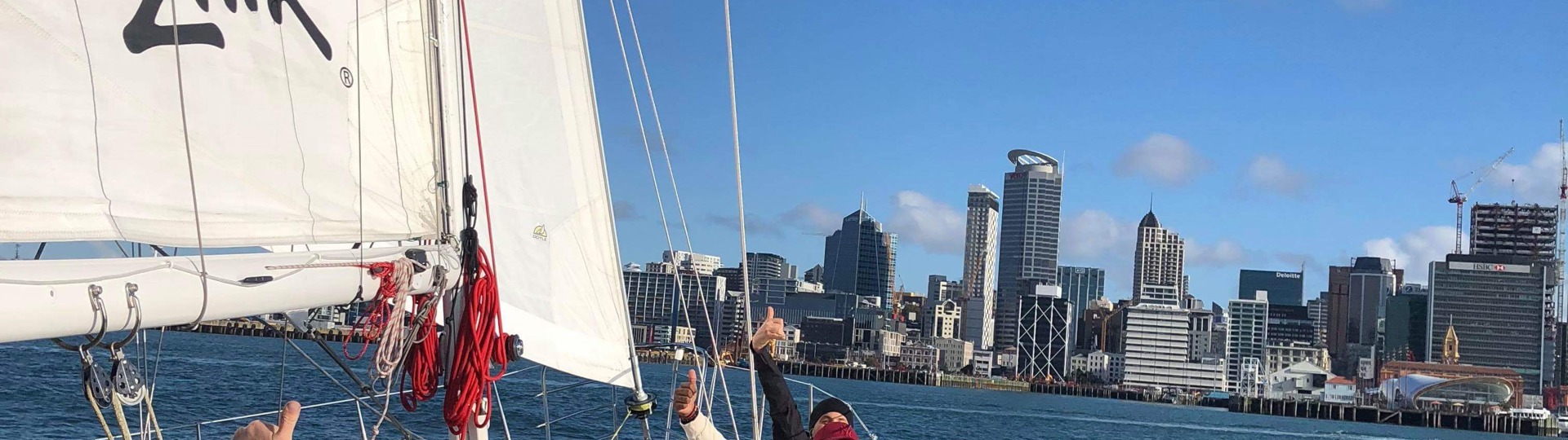 Happy passengers on an Auckland Harbour Sailing Cruise