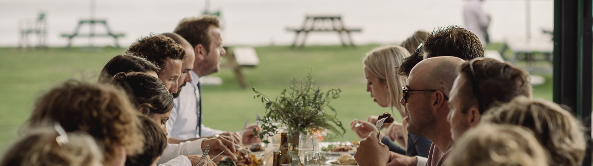 Group dining at private function at Otehei Bay