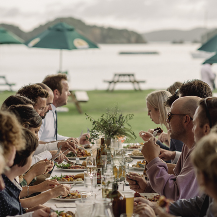 Group dining at private function at Otehei Bay