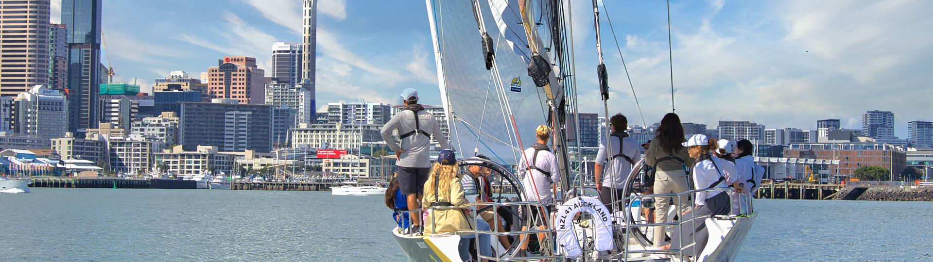 Explore Group | Auckland | Sailing in front of the sky tower