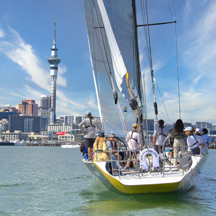 Explore Group | Auckland | Sailing in front of the sky tower